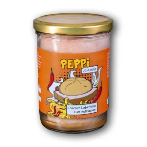 Peppi Jalapeno - Leberkäse im Glas mit orangem Etikett vor weißem Hintergrund