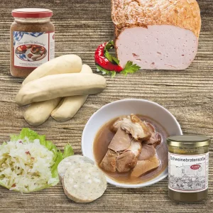Bayrisches Partybuffet auf hellem Holzhintergrund